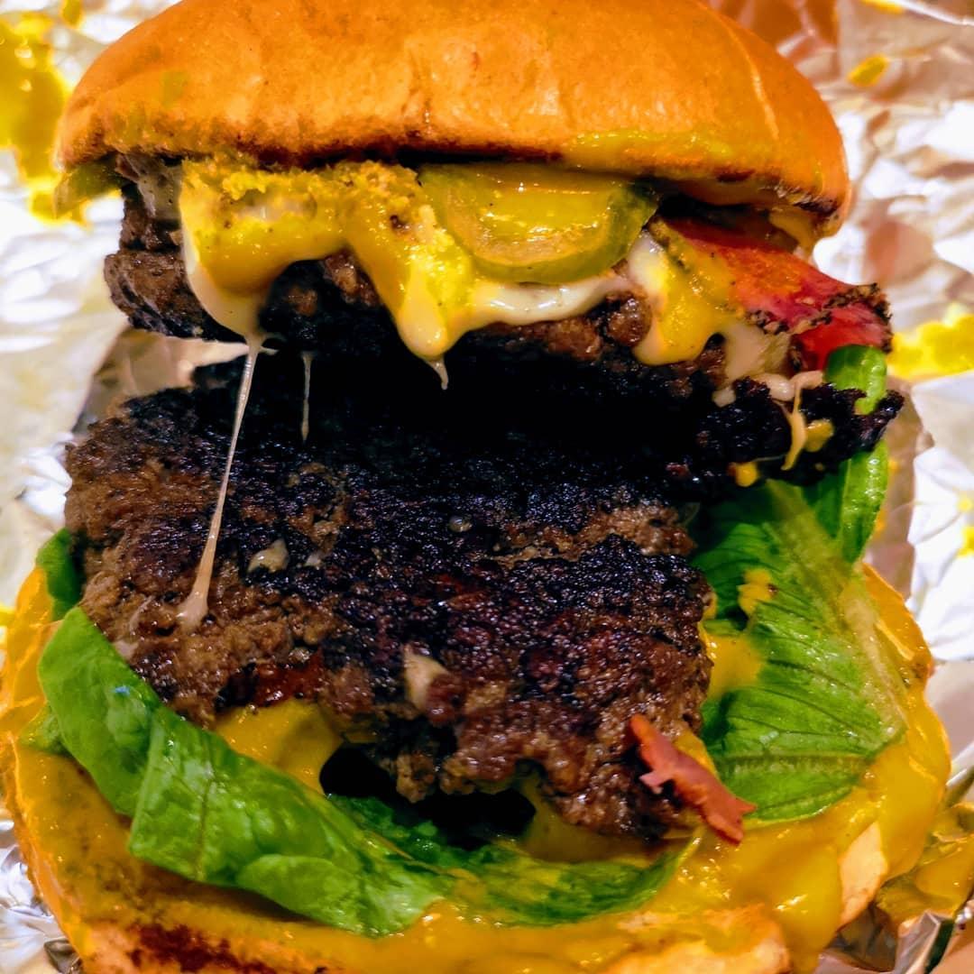  - Guess where this is from??? The Reuben burger - 2x beef burgers, Swiss cheese, pastrami, pickles, lettuce and mustard.