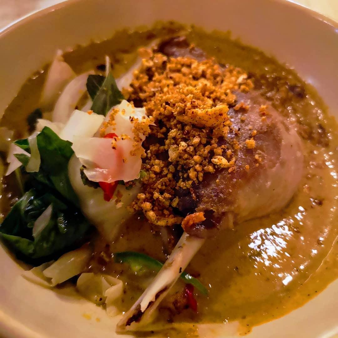  - Roast duck leg and long pepper red curry, herb salad.
