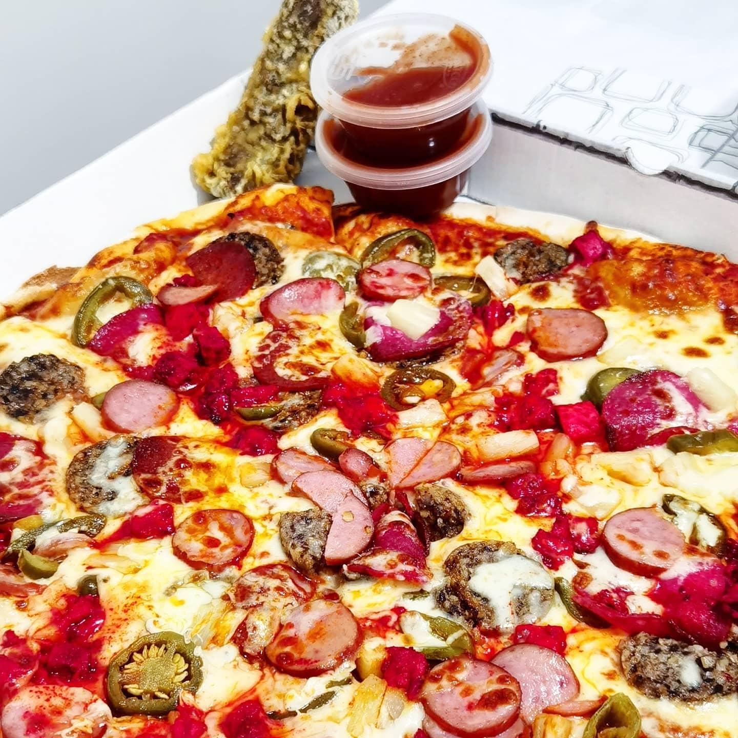  - DEEP FRIED MARS BAR! And a 14 inch Cheese, Haggis,	jalapeÃ±os, Pepperoni, Pineapple, Salami, Smoked Sausages, Spicy Chicken.