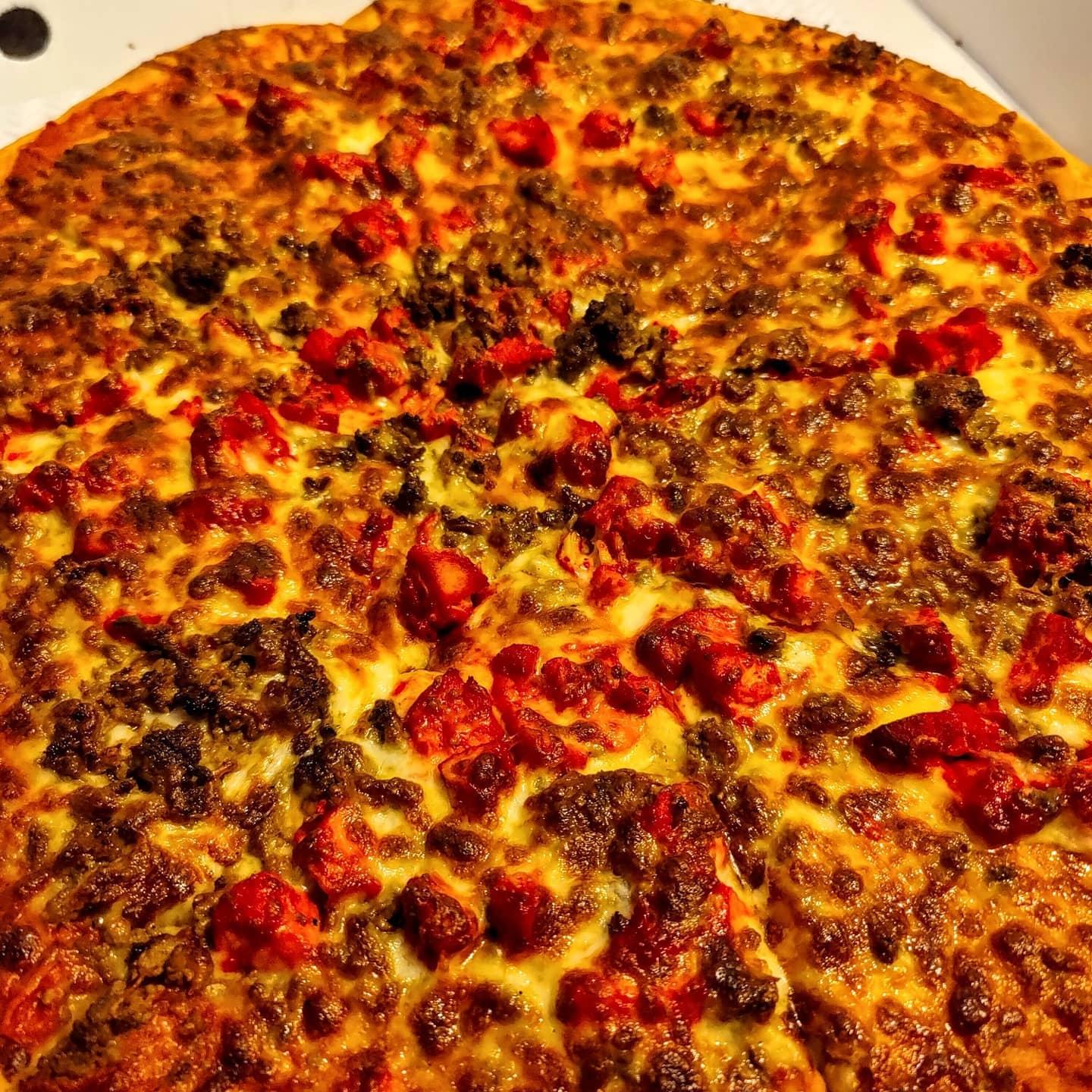  - 14 inch spicy chicken spicy mince pizza from dinas.